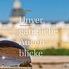 Titelbild des Jahresmagazins „Unvergängliche Augenblicke“ des Badischen Landesmuseums. Eine Glaskugel spiegelt das Karlsruher Schloss und steht für neue Perspektiven auf Kultur und Geschichte.