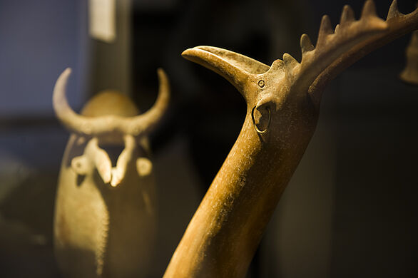 Antique casting vessels in the form of bull and deer