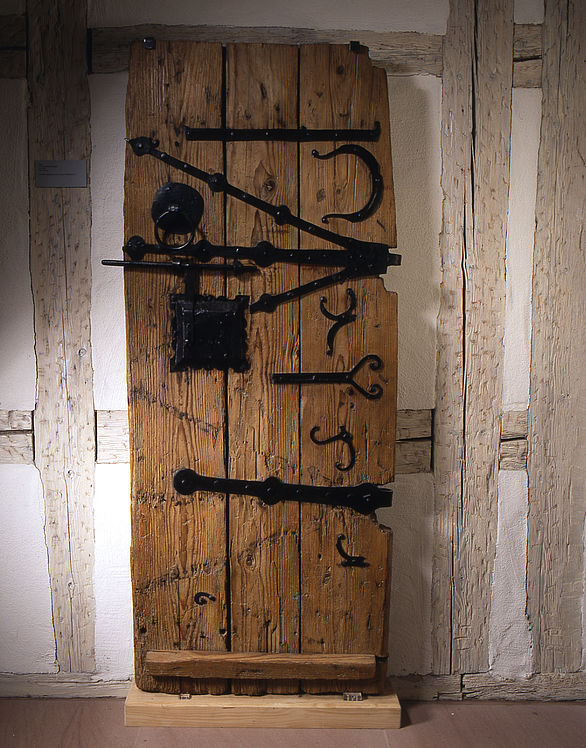 View of an old wooden door in the Hirsau Monastery Museum