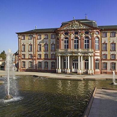 View of Bruchsal Palace with a fountain