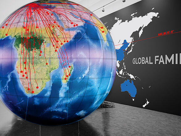 Skizze des Ausstellungsraums Global Family mit einem Globus